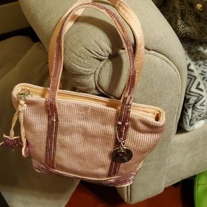 THE SAK very good condition like  new